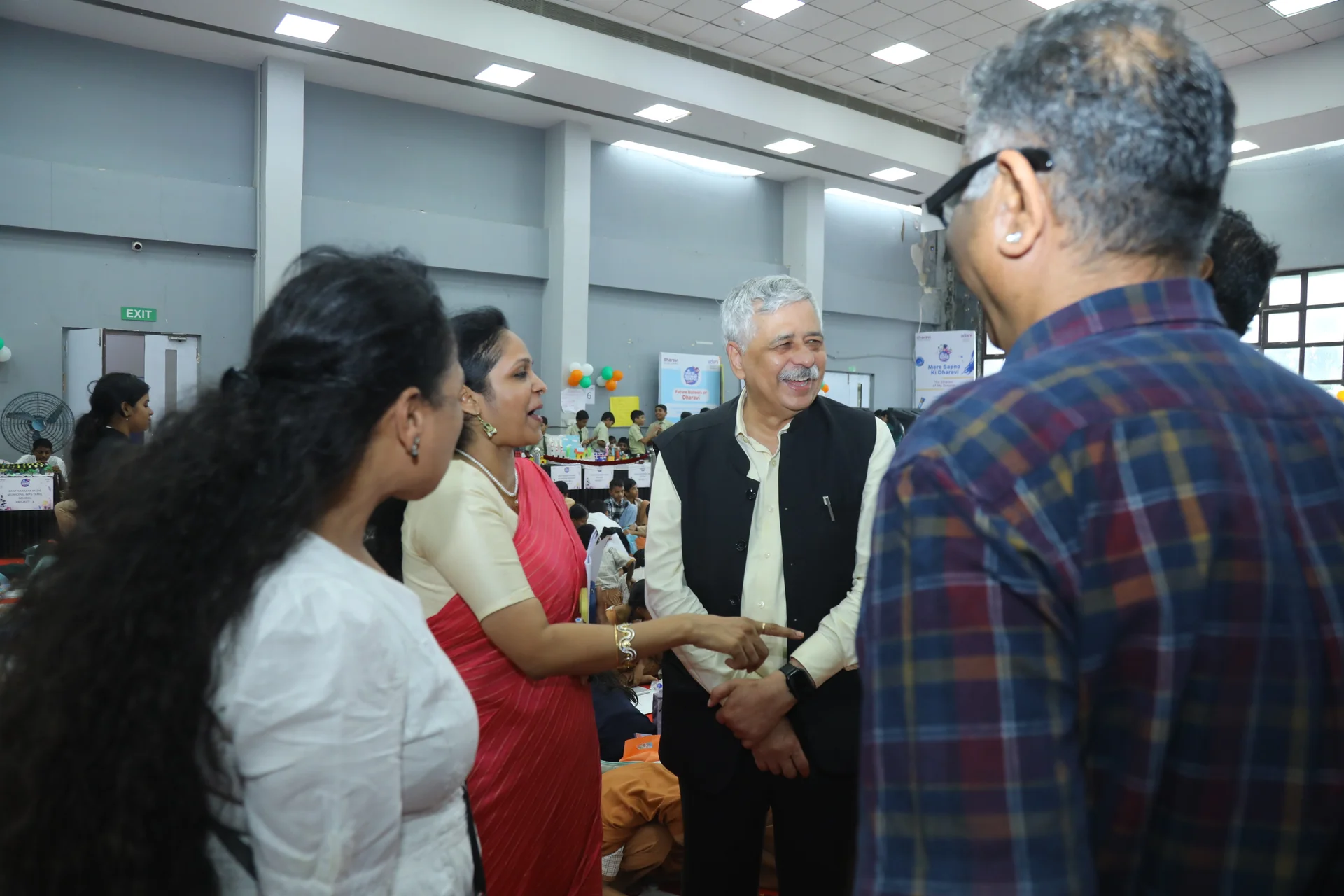 Mere Sapno Ki Dharavi 2.0 — Guests interacting at the exhibition
